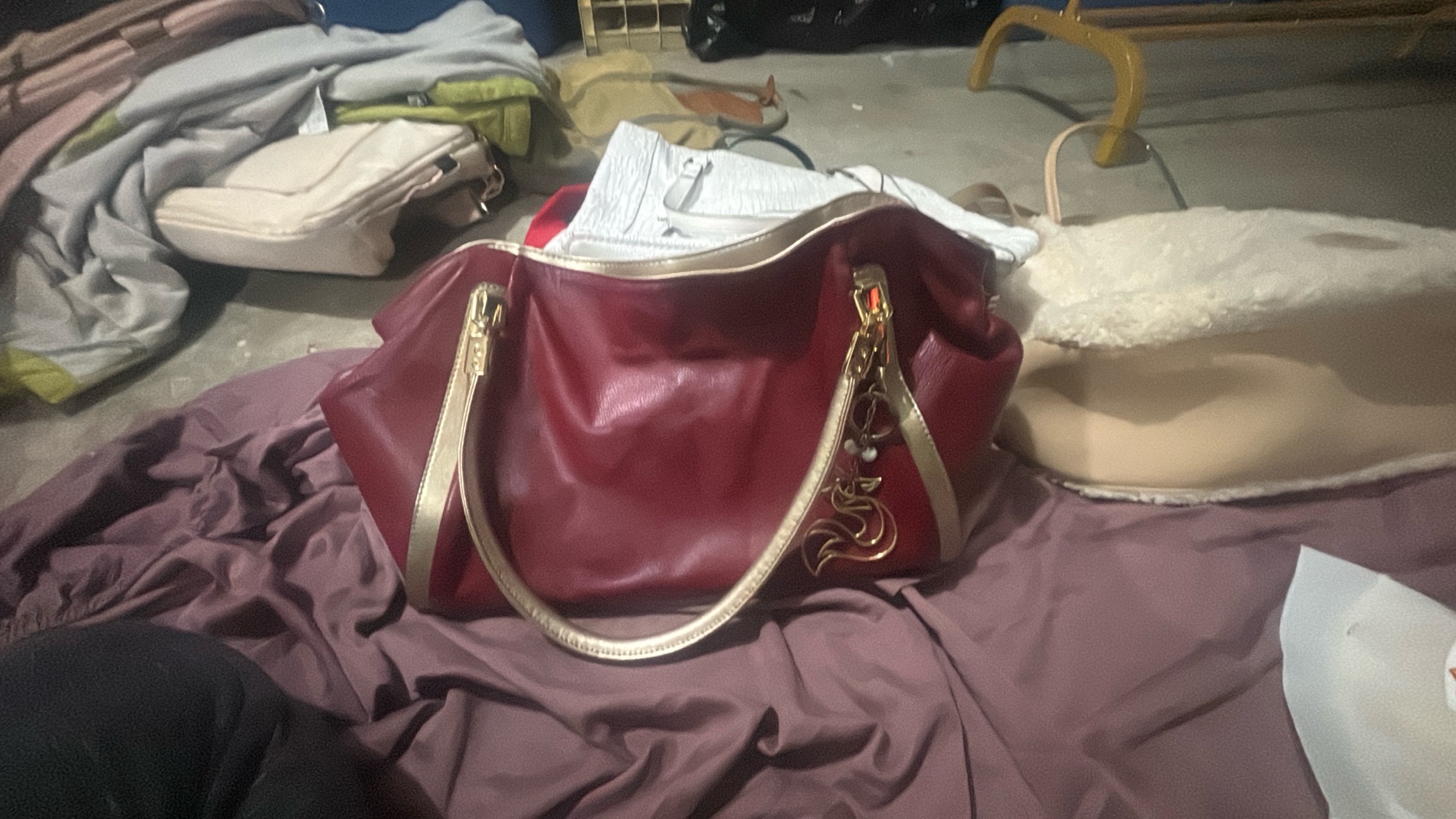 Elegant Red Leather Handbag with Gold Accents