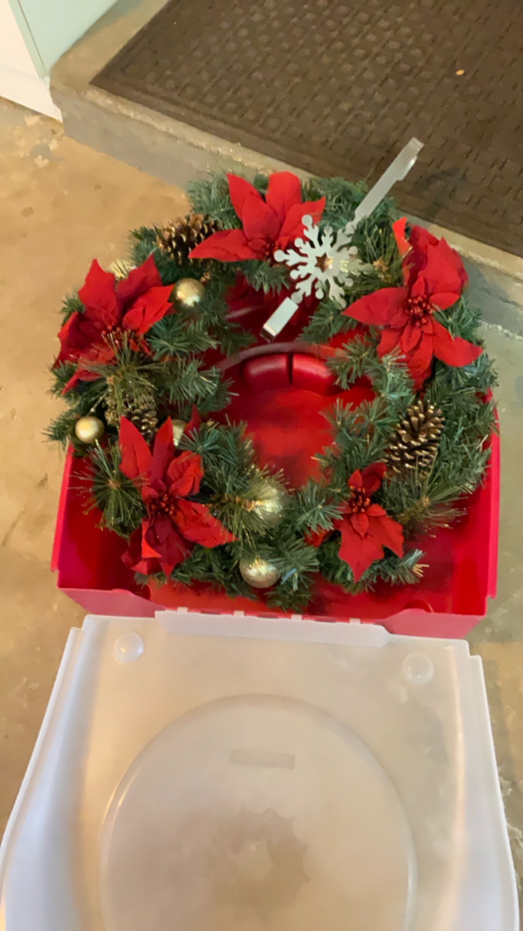 Festive Christmas Wreath with Poinsettias and Pinecones