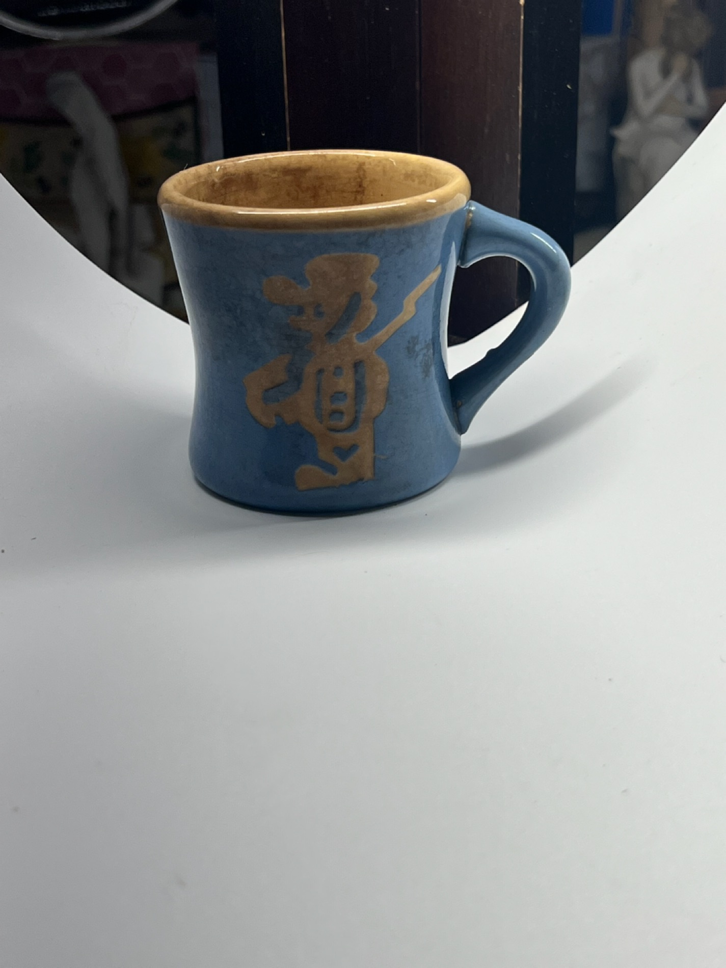 Blue Ceramic Mug with Cartoon Figure Design