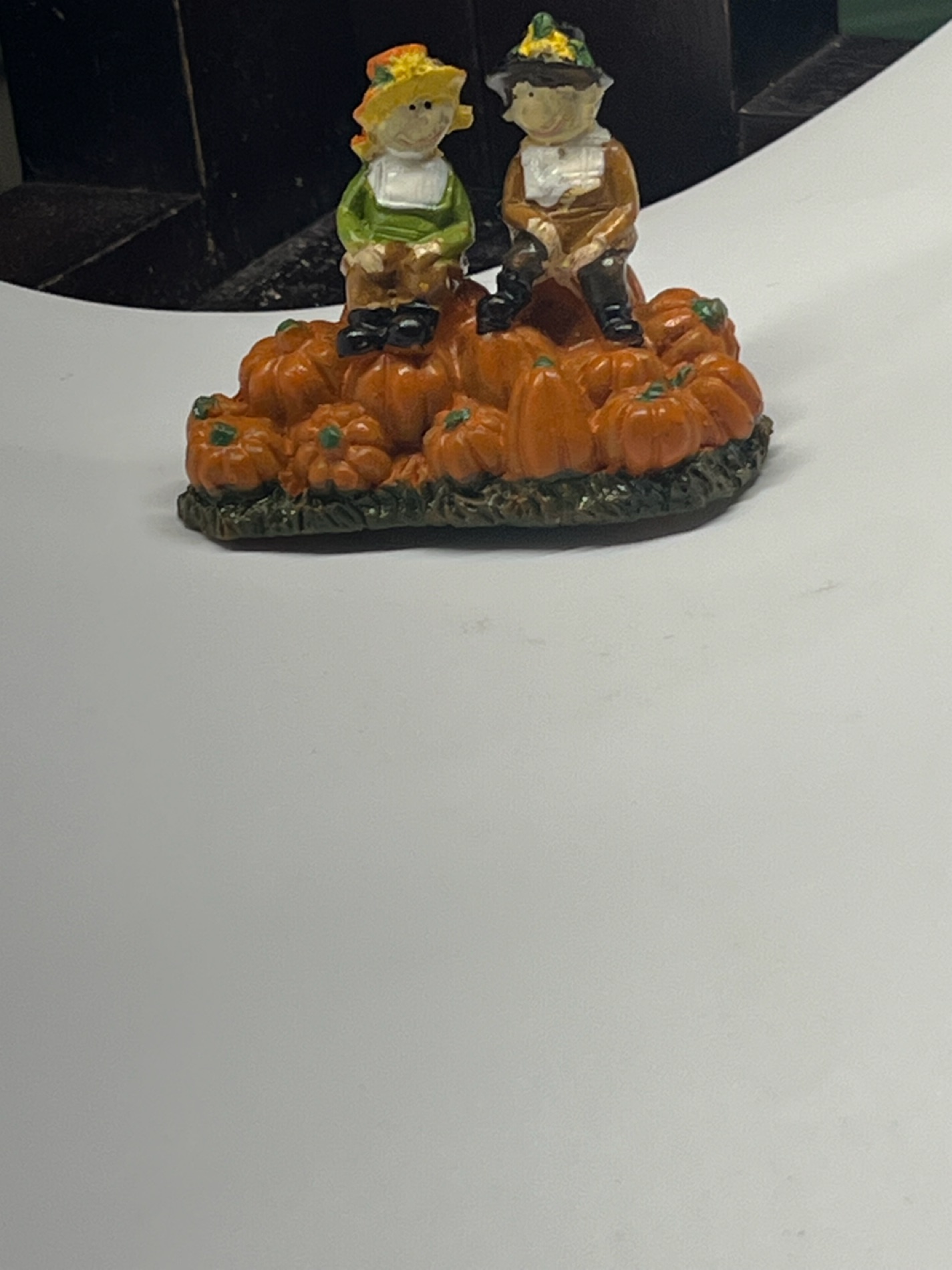 Charming Autumn Figurine with Children and Pumpkins
