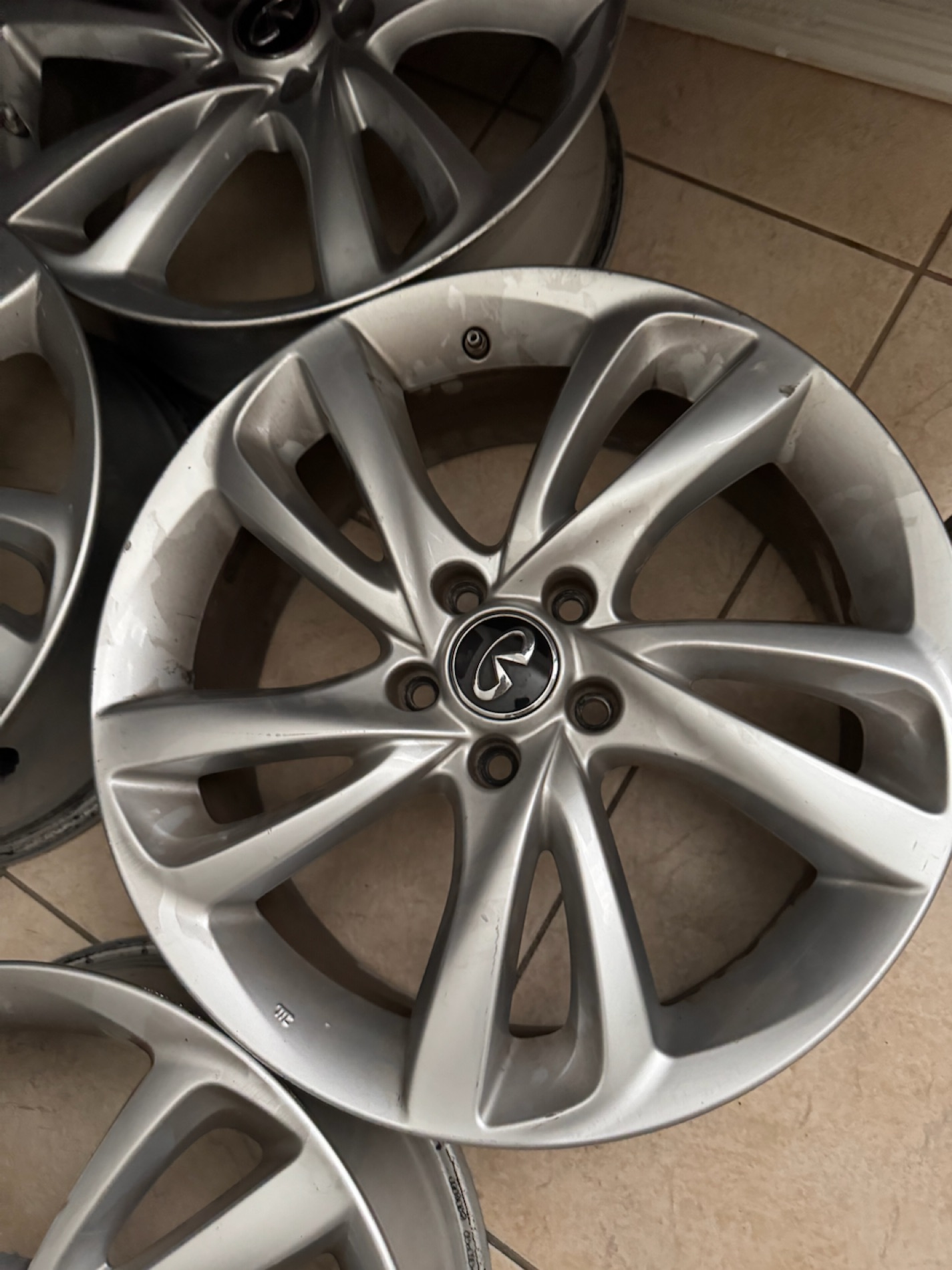 Set of Four Silver Alloy Car Wheels photo