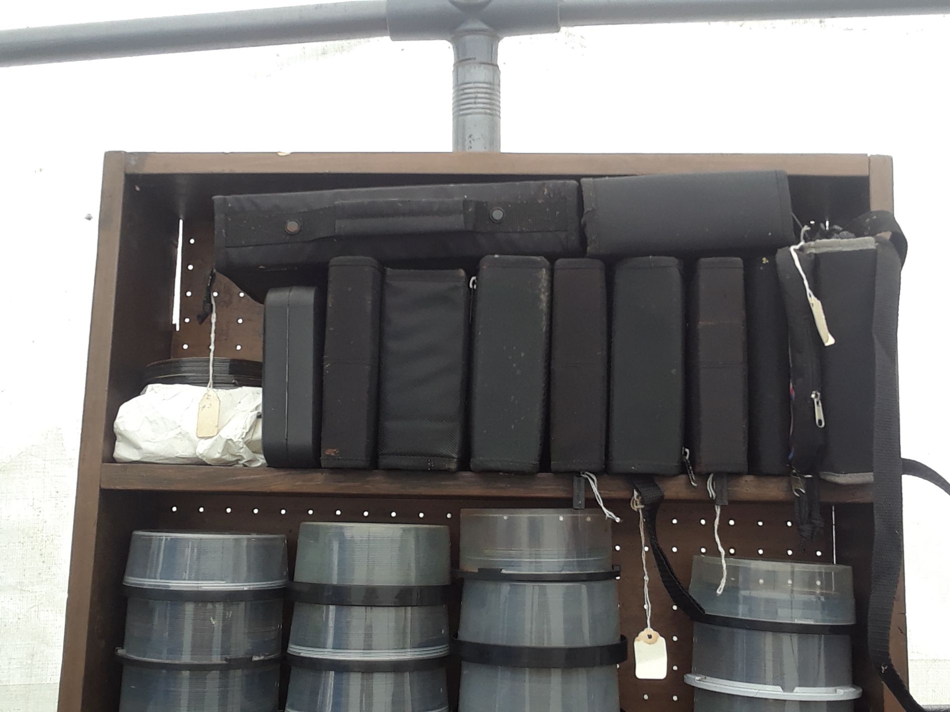 Collection of Film Reel Cases with Storage Boxes