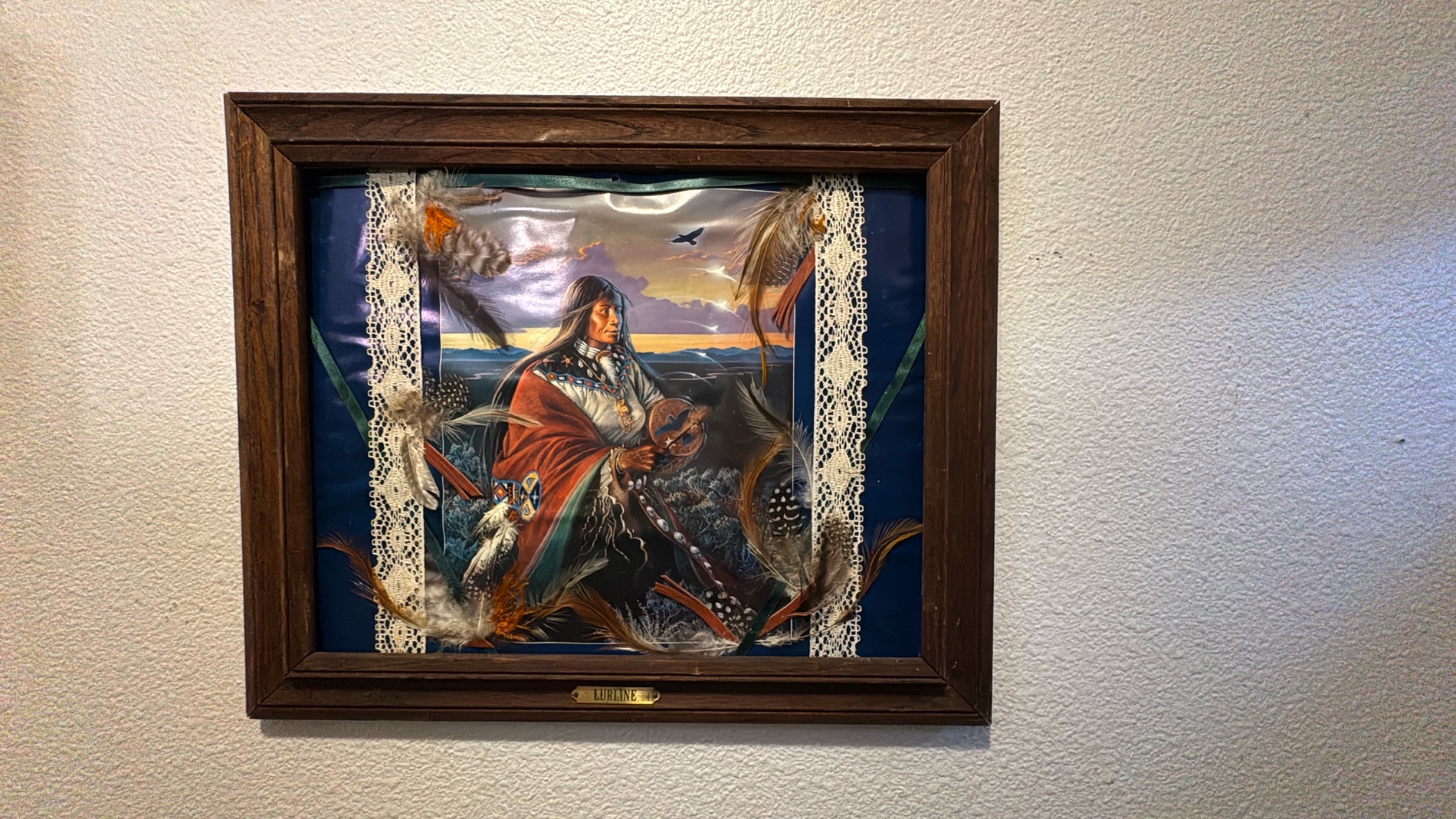 Framed Native American Themed Art with Decorative Feathers