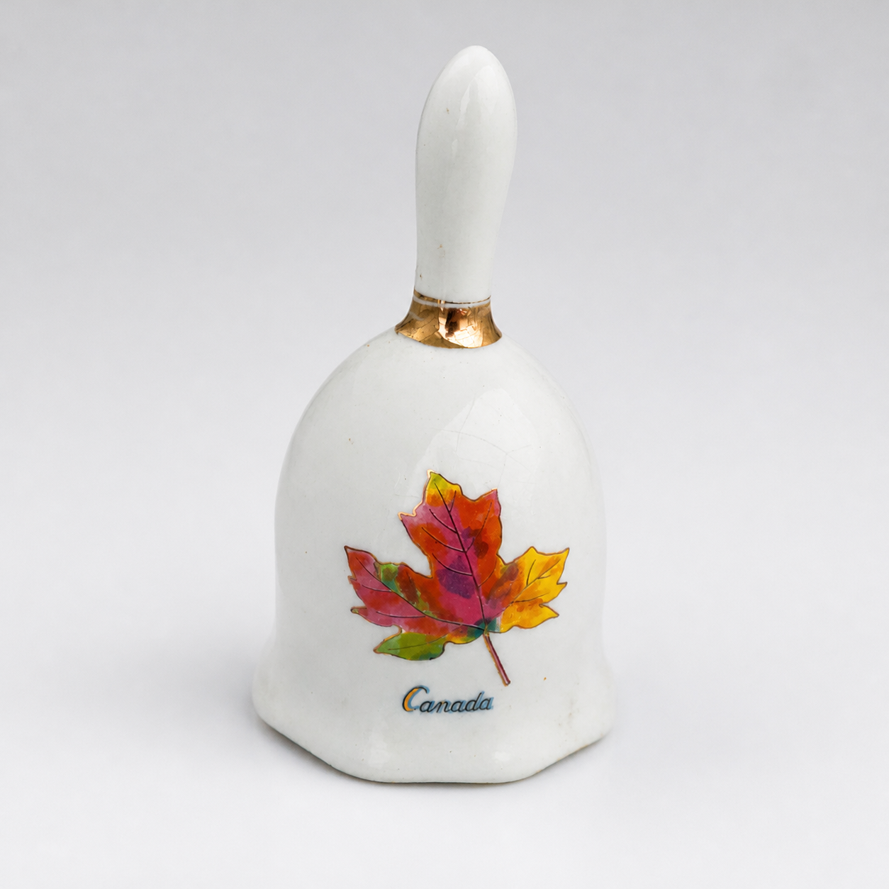 Ceramic Souvenir Bell with Canada Maple Leaf Design