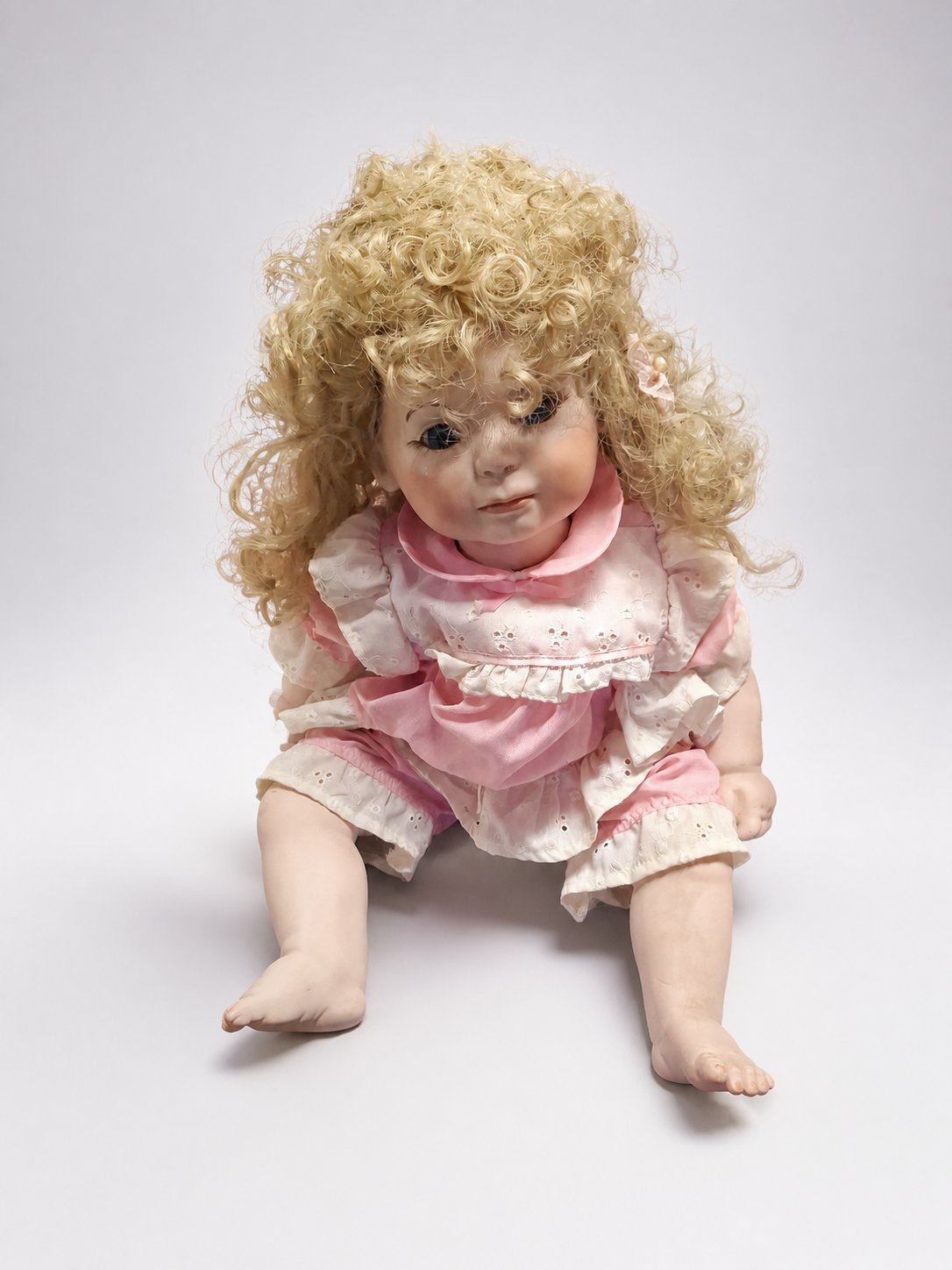 Collectible Porcelain Doll with Blonde Curls