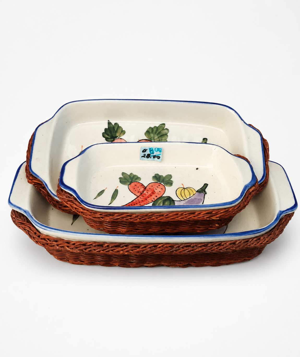 Set of Decorative Ceramic Baking Dishes with Wicker Trays photo